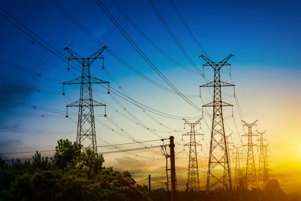 Electricity pylons at sunset